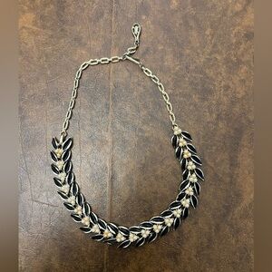 Costume Jewelry Pearl, Black, gold colored. Dia 5.5” adjustable slightly shorter